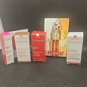 Clarins Skincare Collection - Red, White, and Gold
